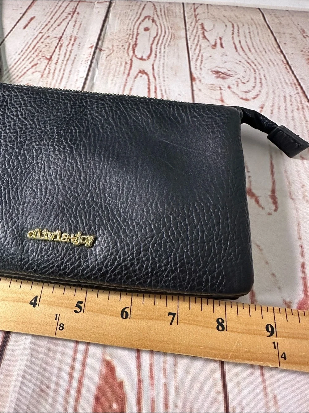 Olivia + Joy Black Pebbled Leather Wristlet Clutch with Gold Logo